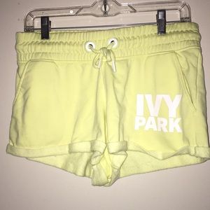 yellow and white ivy park lounging shorts